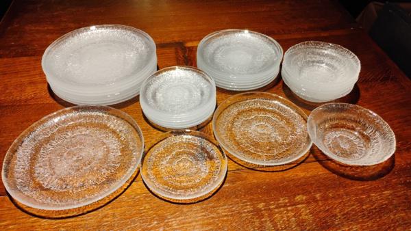 Set of fancy glass plates. 9 large, 8 medium, 8 small, 6 bowls.